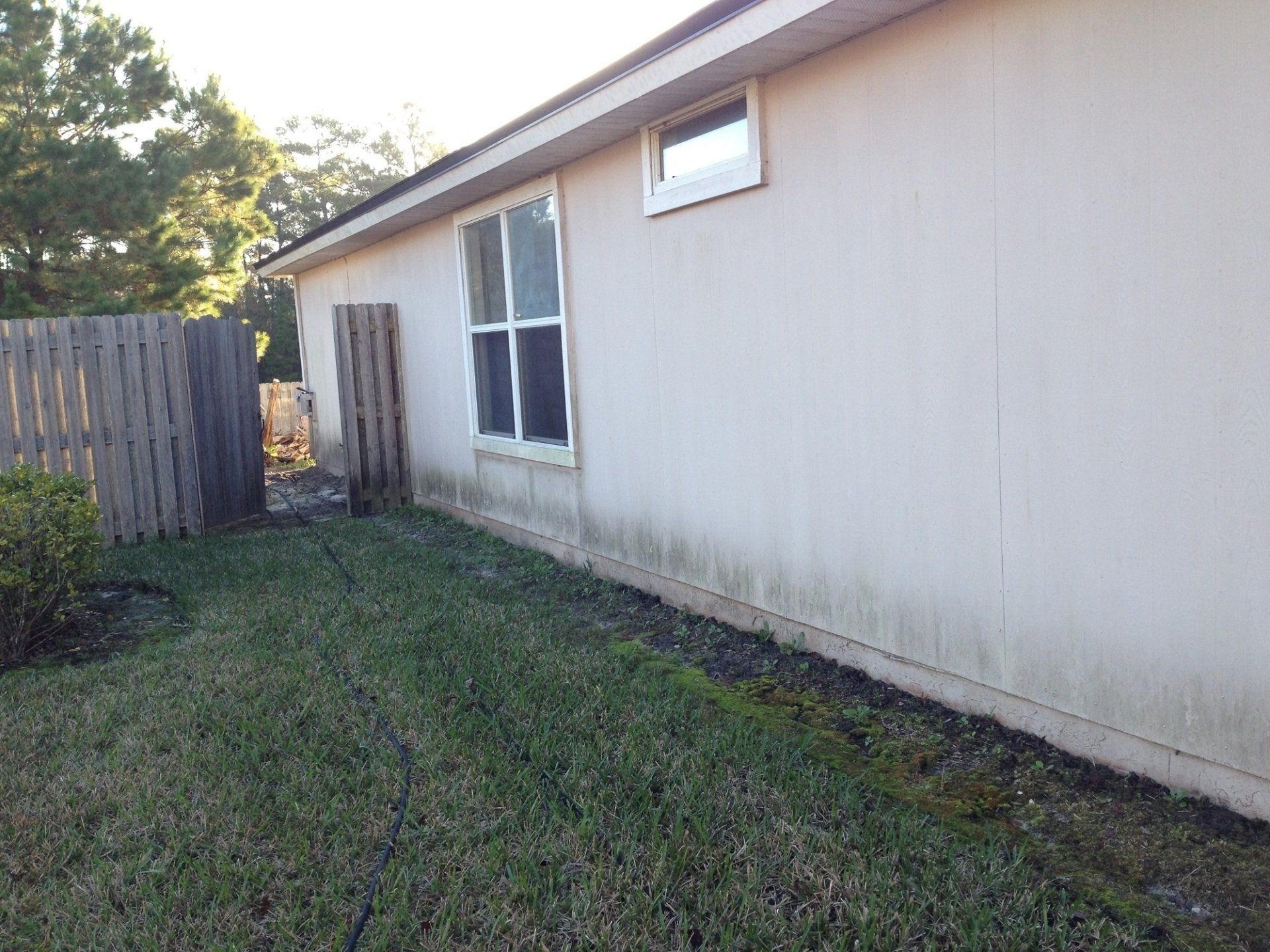 Stewart Pressure Cleaning Before pressure washing service of house