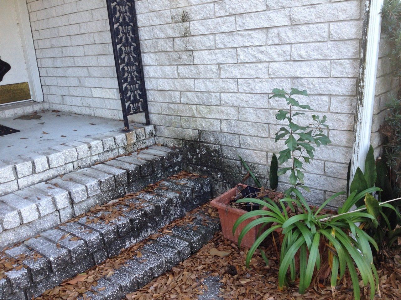 Stewart Pressure Cleaning Before pressure washing service of brick steps
