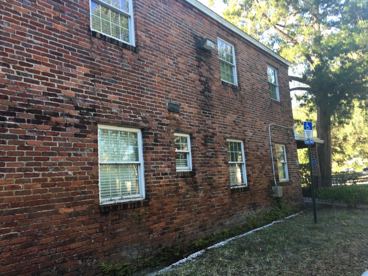 Stewart Pressure Cleaning Before pressure washing service of brick wall