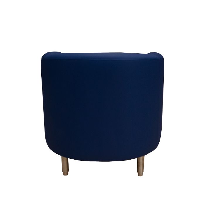 The back of a blue chair with wooden legs on a white background.