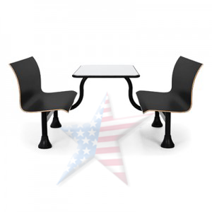 A table and chairs with an american flag in the background