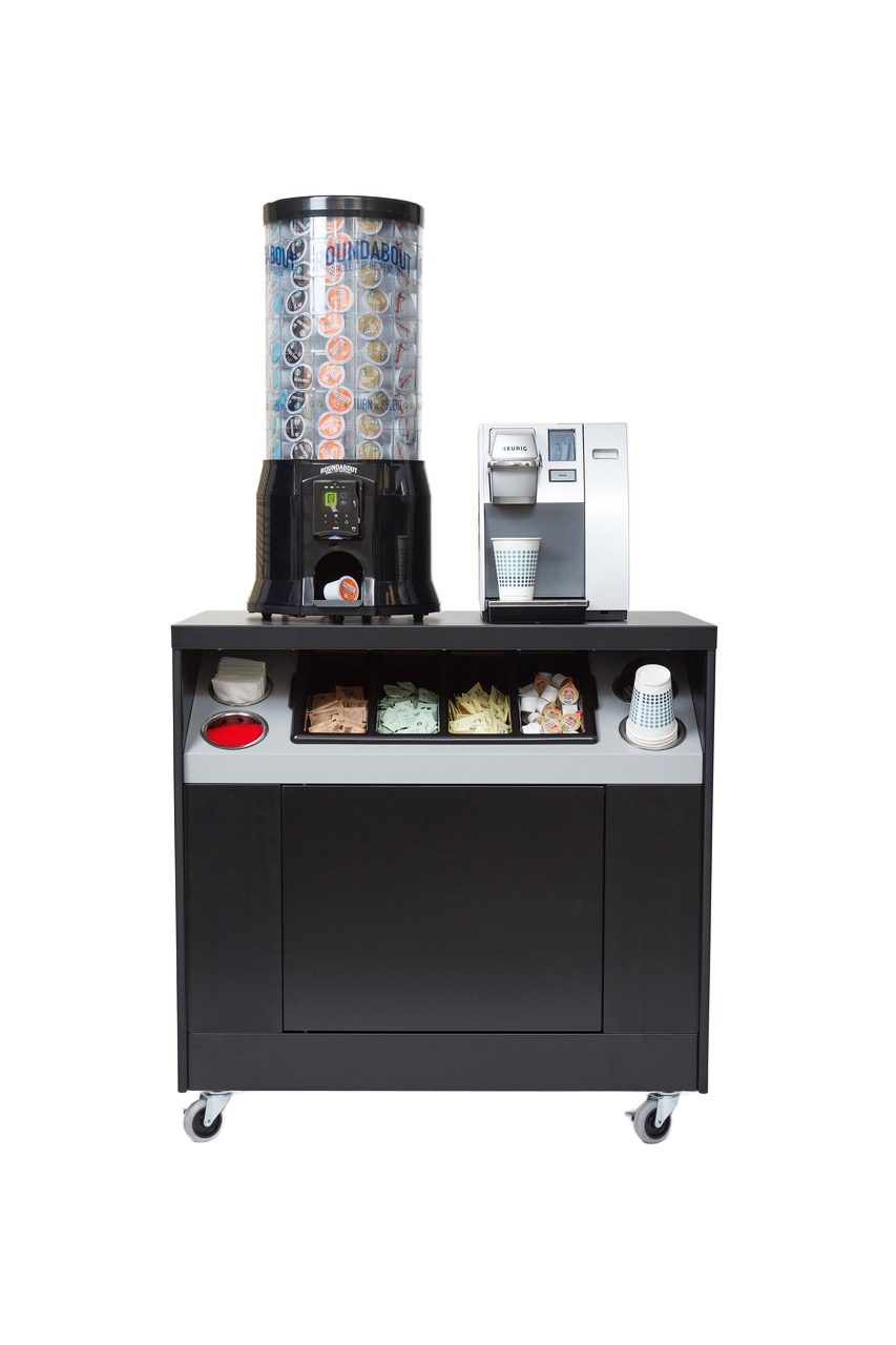 A black cart with a coffee machine and a gumball machine on it.