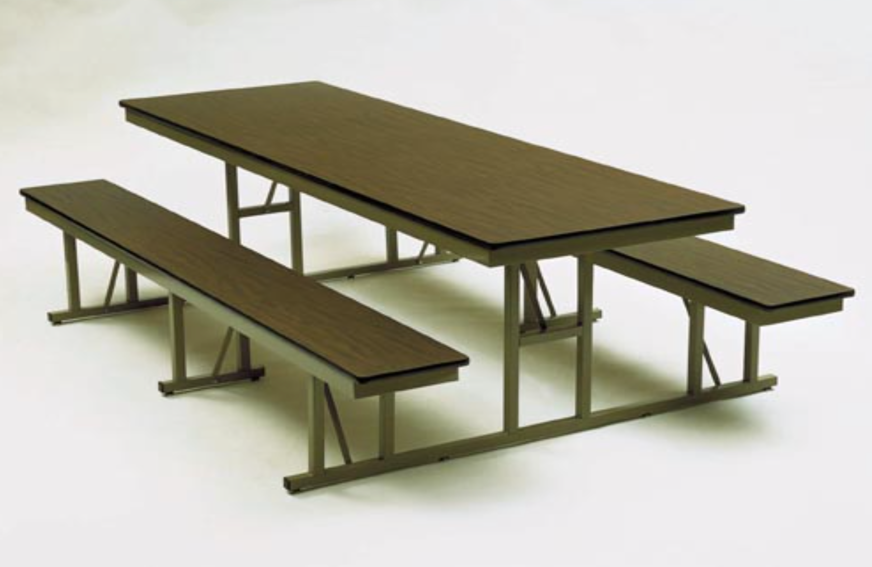 A brown picnic table with two benches on a white surface