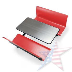 A red bench with a table attached to it