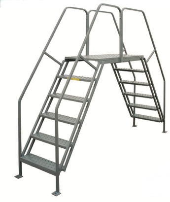 A metal staircase with a platform on top of it on a white background.