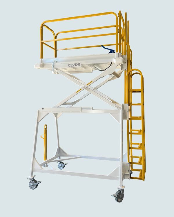 A white and yellow scaffolding with a ladder attached to it