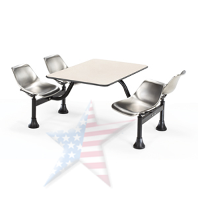 A table and chairs with an american flag in the background