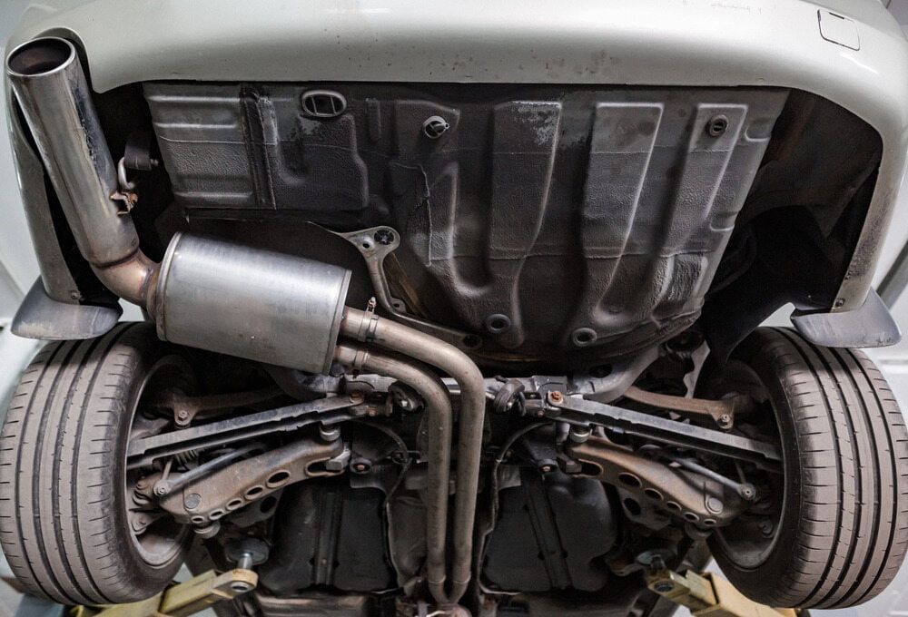 Undercarriage of a Vehicle, Showing Exhaust System — Autopro Taree in Taree, NSW