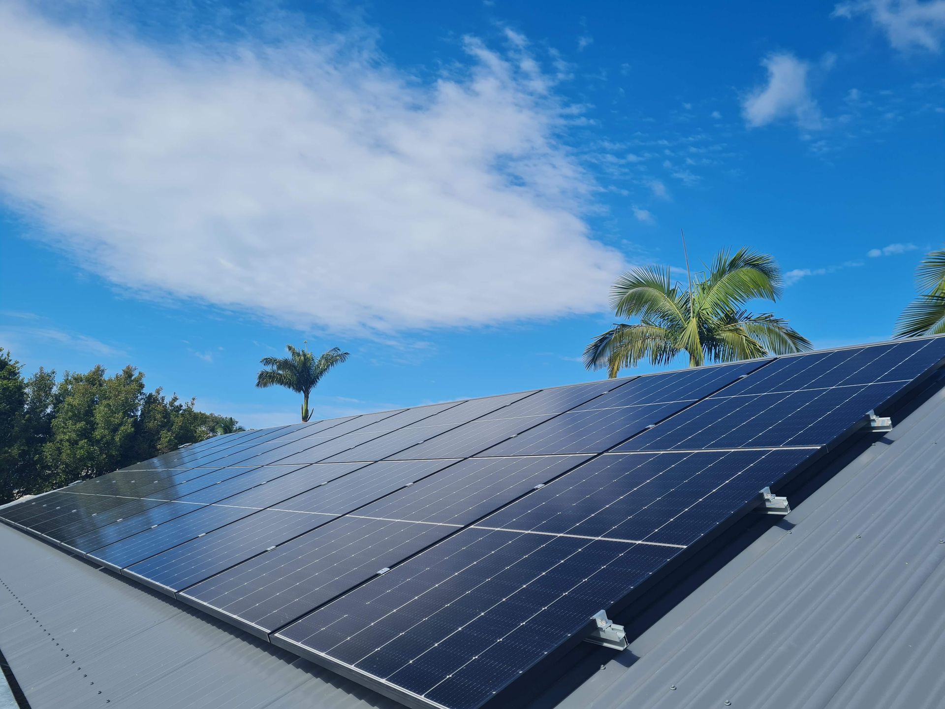 A roof with a lot of solar panels on it