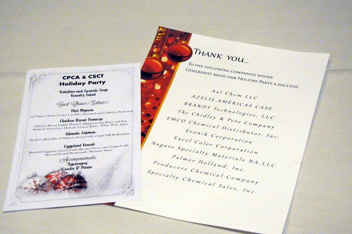 A thank you card and a menu for a holiday party