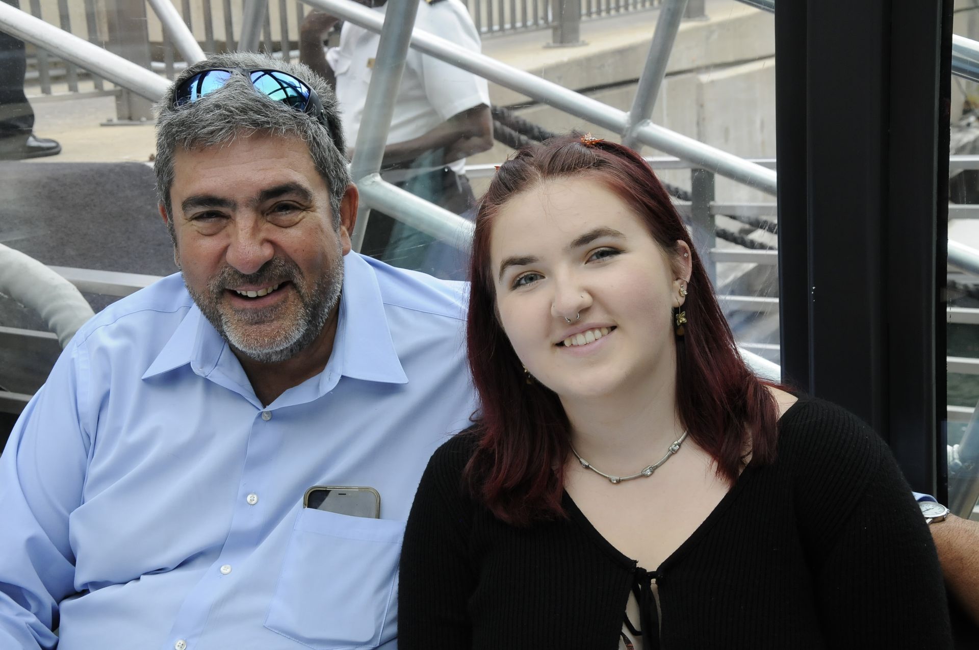 A man and a woman are posing for a picture together