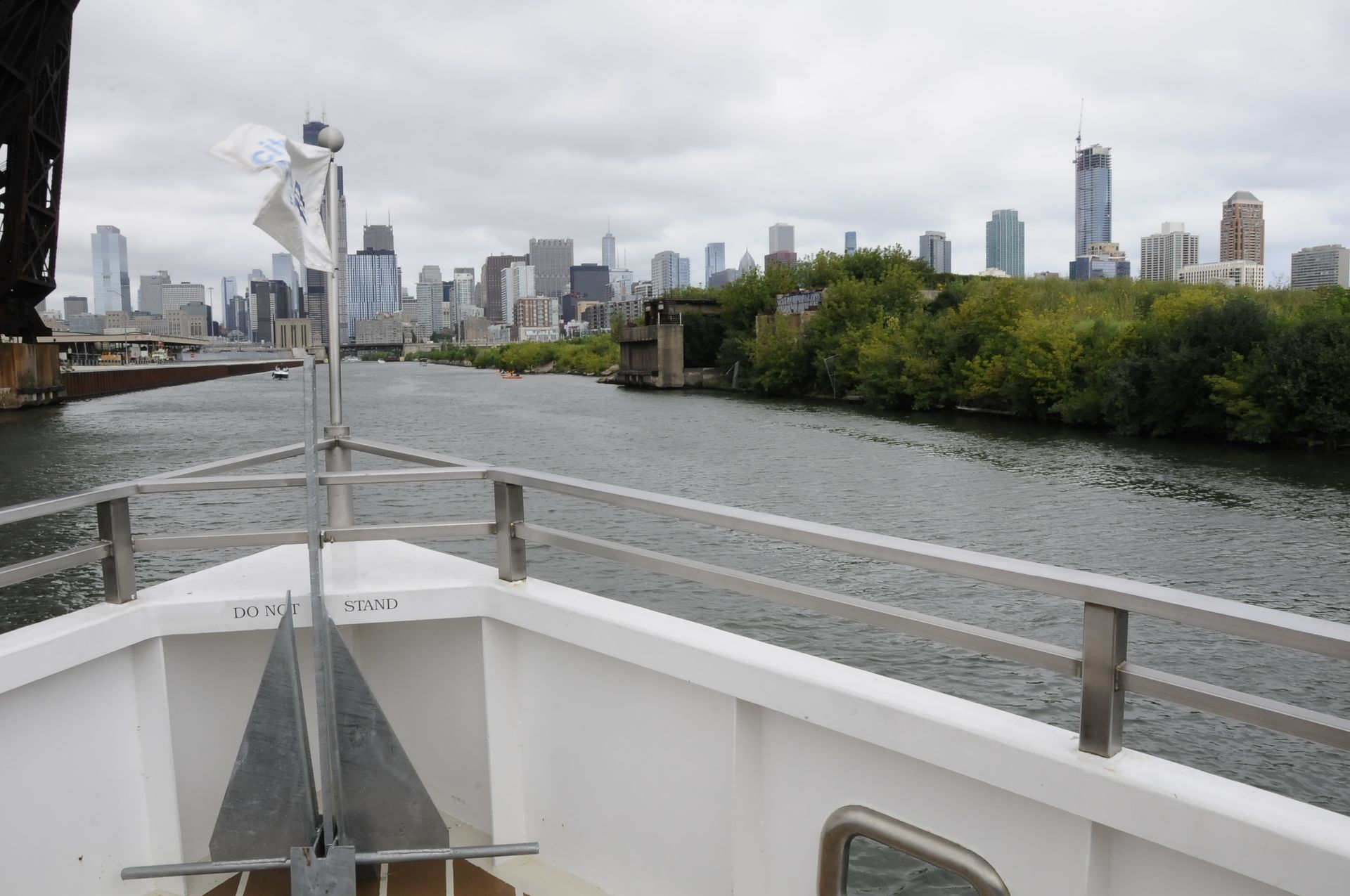 A view of a city skyline from the back of a boat