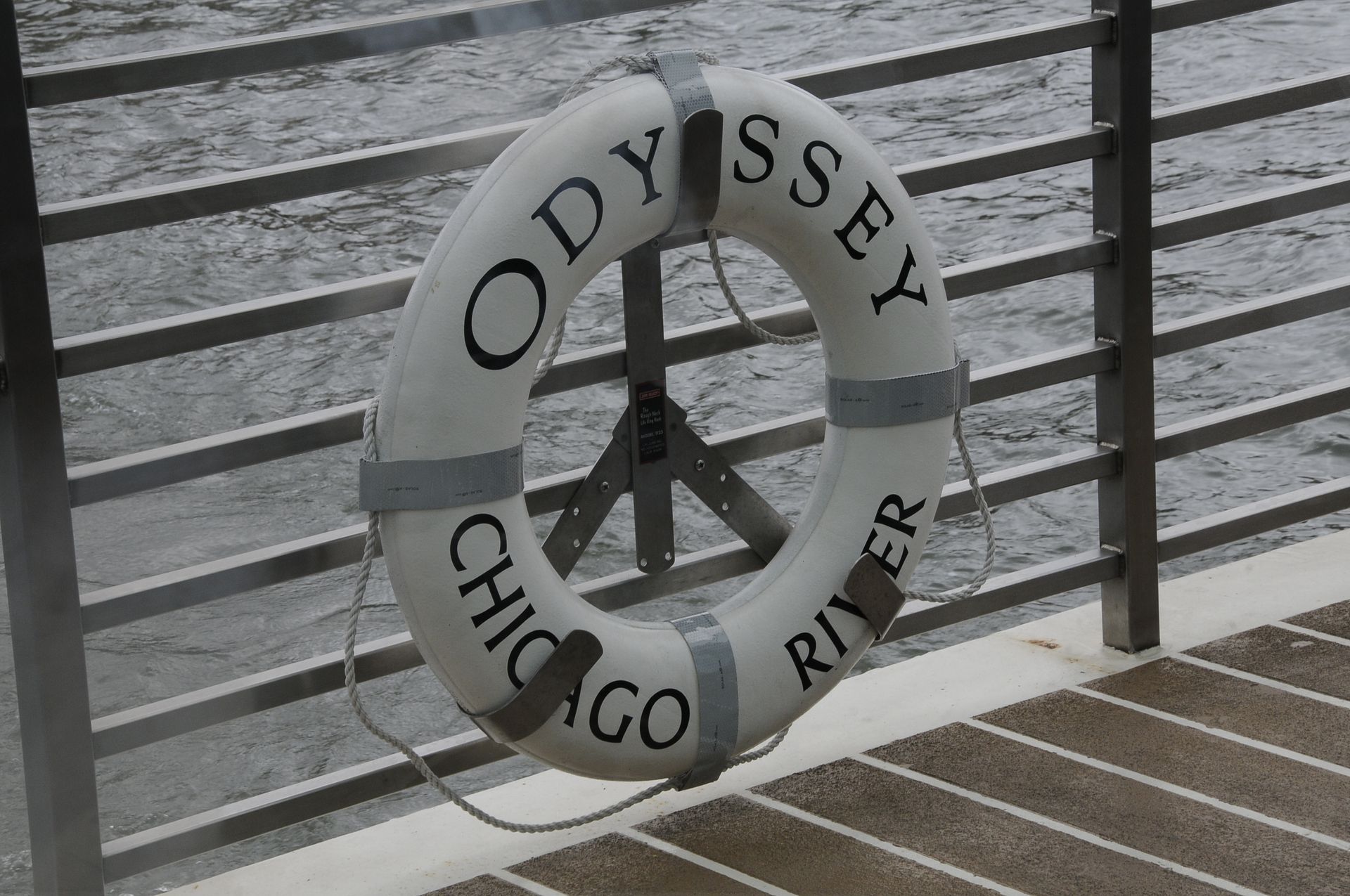 A life preserver that says odyssey chicago river on it