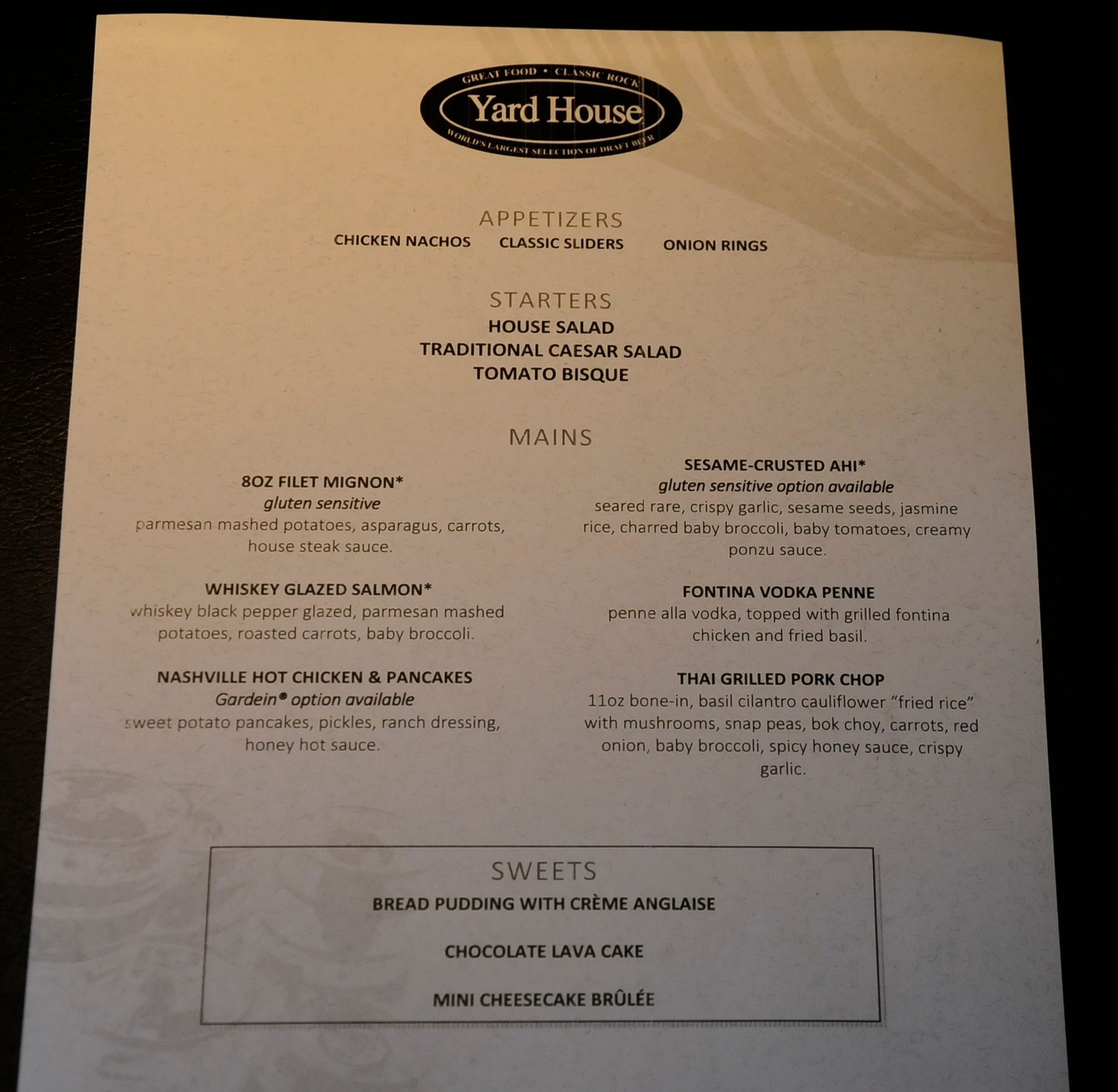 A menu for yard house includes appetizers starters and desserts