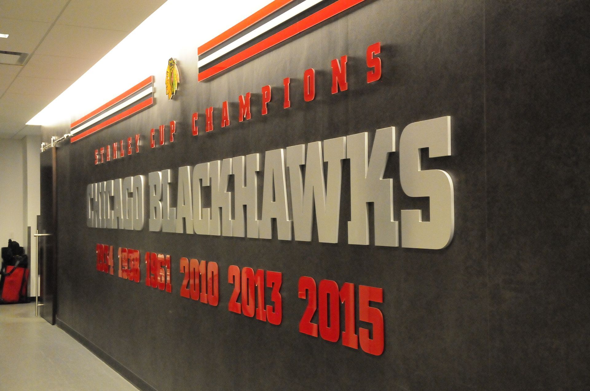 A wall with the word blackhawks on it