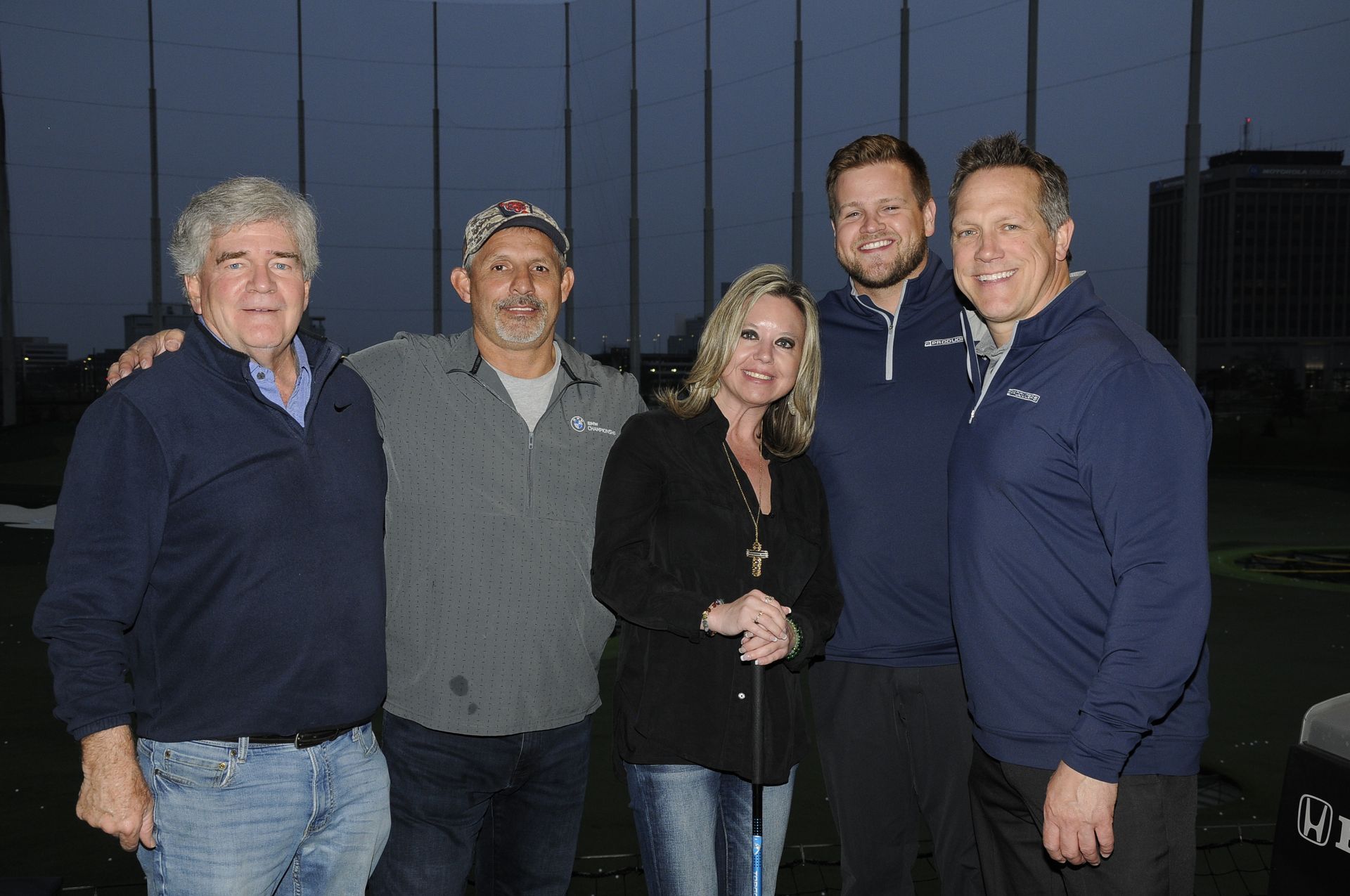 A group of people are posing for a picture together.