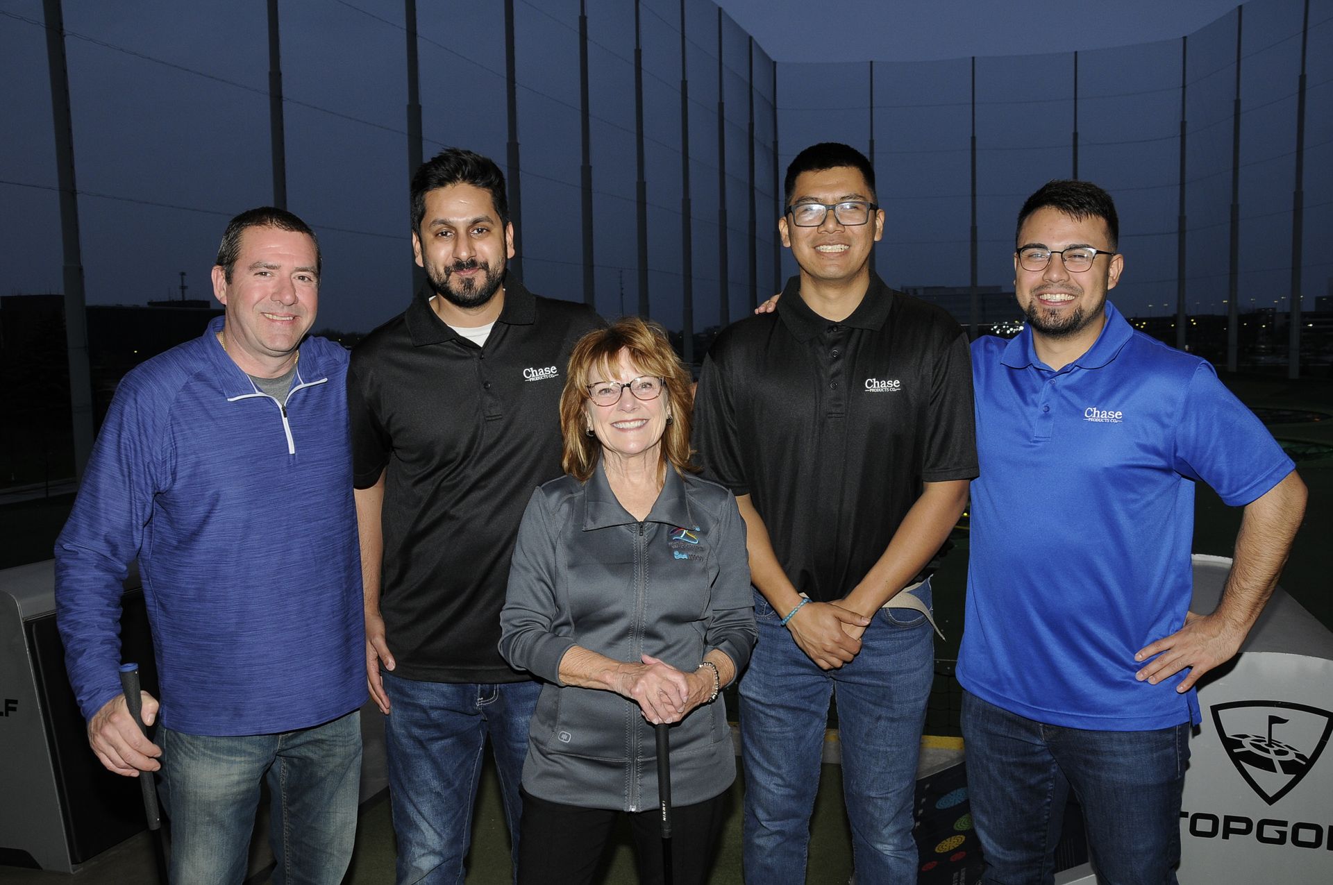 A group of people are posing for a picture together.