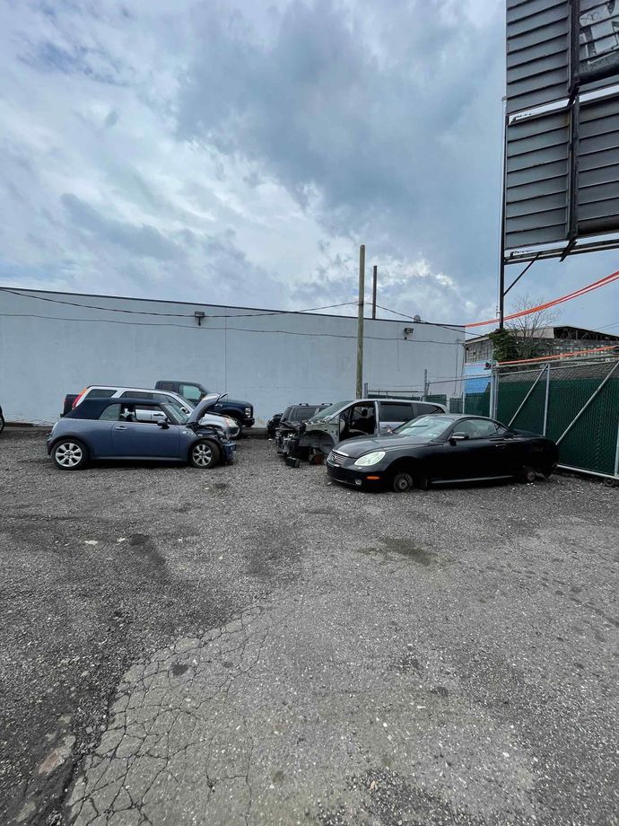 A photo of lined up junk cars in Philadelphia