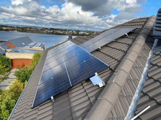 A roof with a lot of solar panels on it