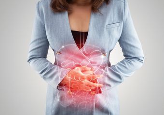 Woman Having Stomach Pain — Bakersfield, CA — American Digestive Liver & Nutritional Disease Center