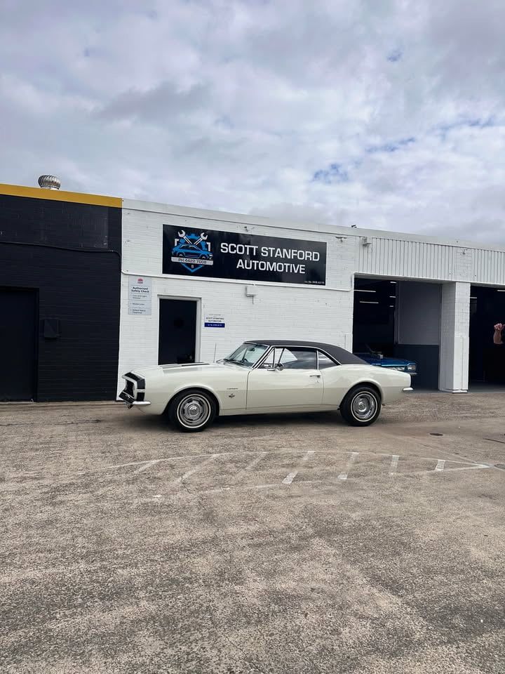 White Classic Car Parked Outside — Scott Stanford Automotive in Nowra, NSW