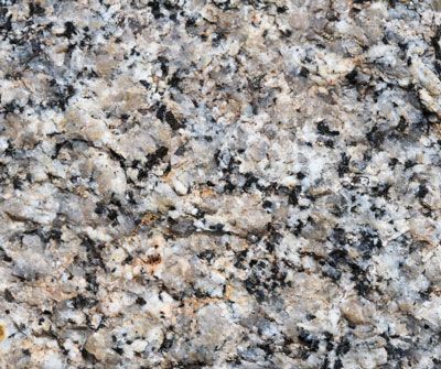 A close up of a granite surface with a lot of small stones