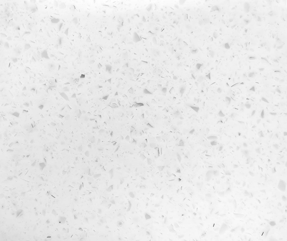 A close up of a white surface with small dots on it.