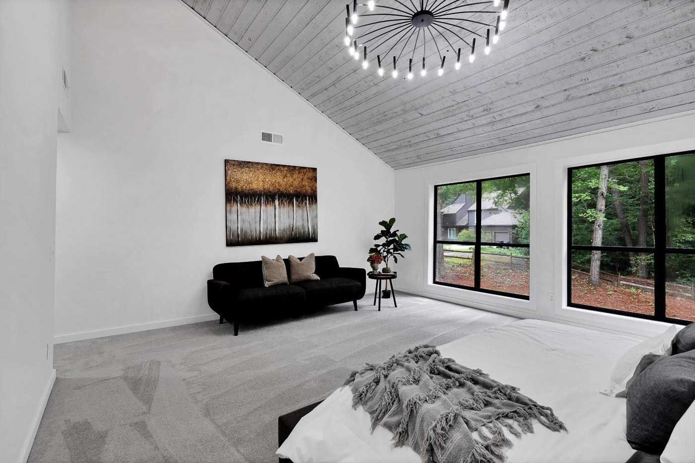 A living room filled with furniture and a fireplace