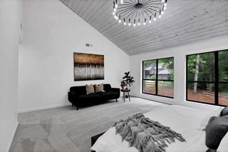 A living room filled with furniture and a fireplace