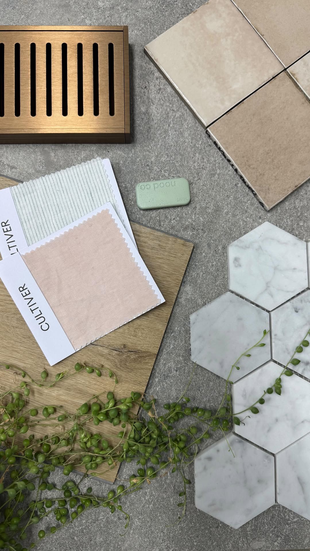 Hands Holding a White Bowl Filled With Neutral-colored Square Tiles — Cooloola Tile Company in Hervey Bay, QLD