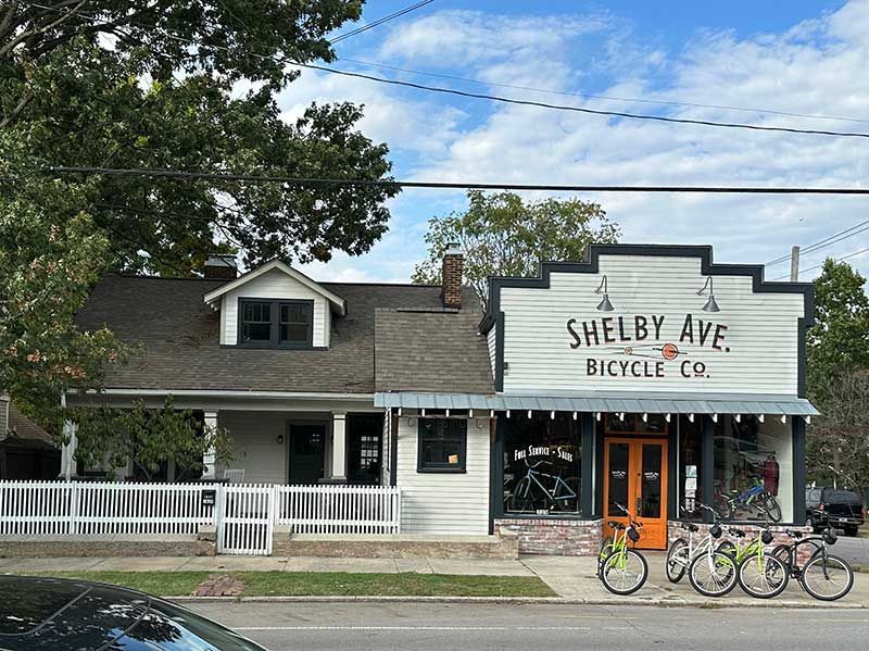 A shelby ave bicycle co. store with bikes parked in front of it