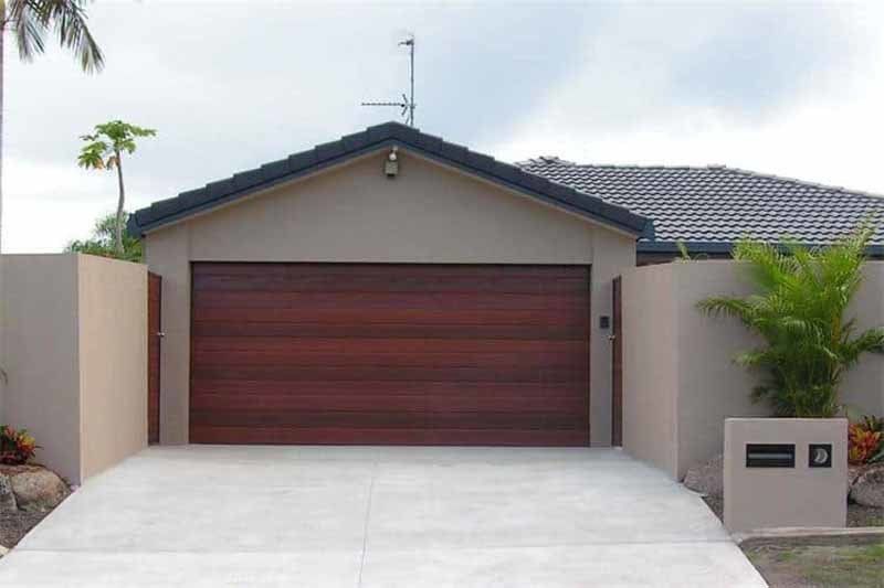 wood garage door on house