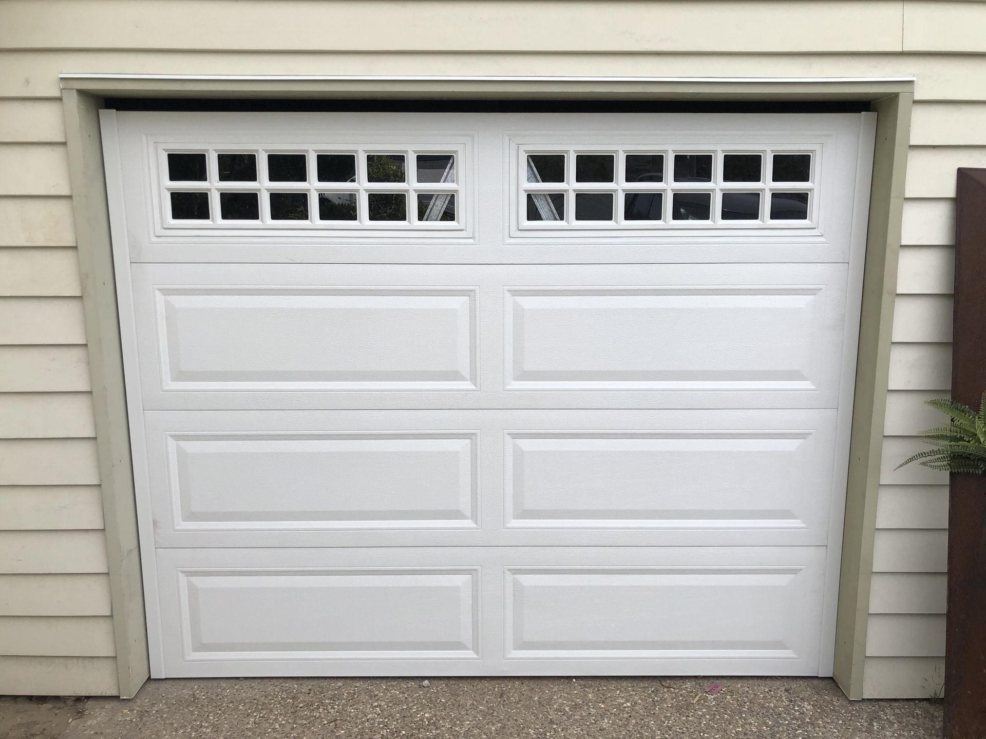 white tilt style garage door