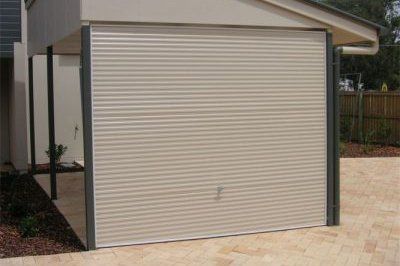 cream colored tilt style garage door