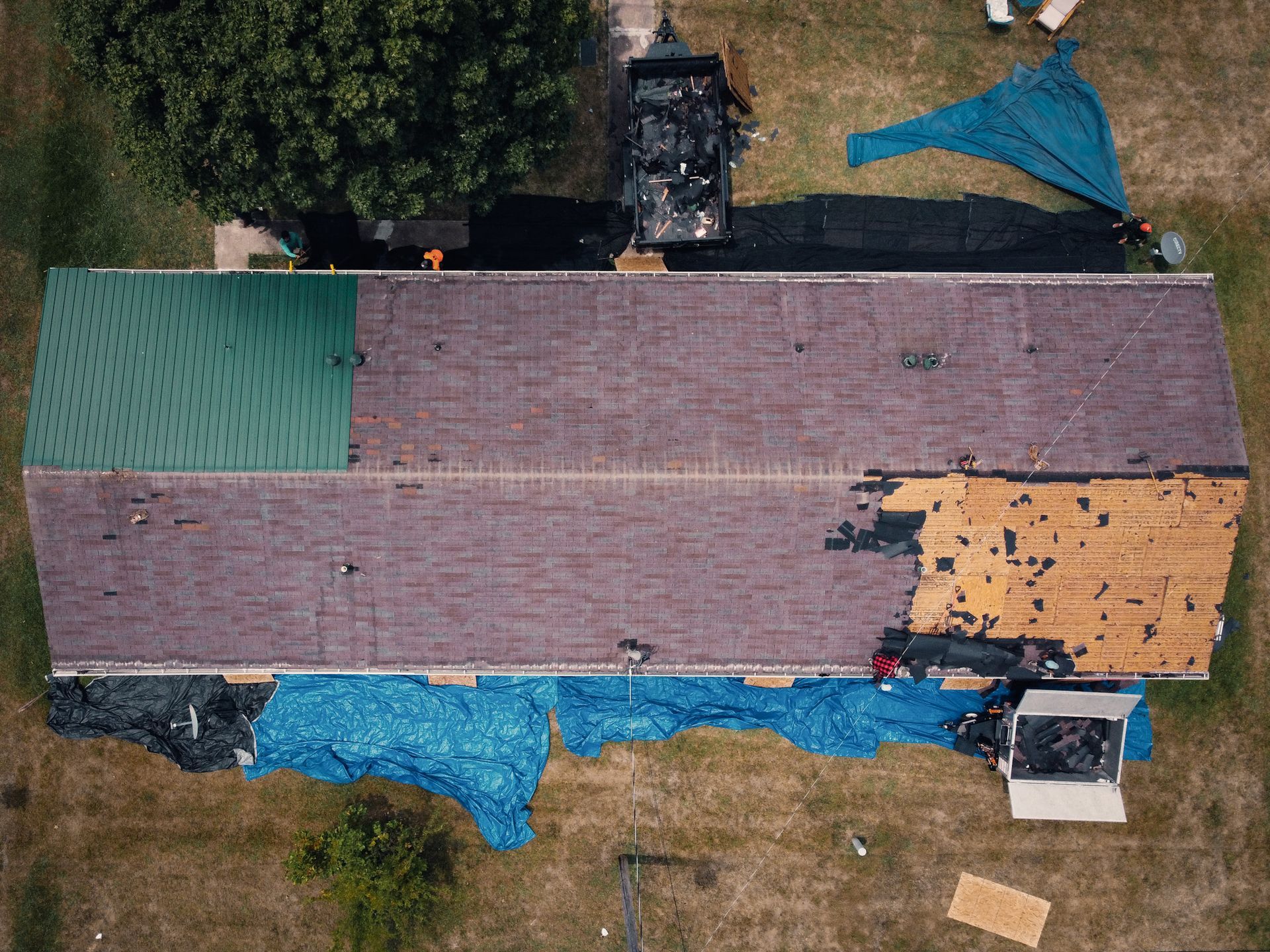 An aerial view of a house that is being remodeled.