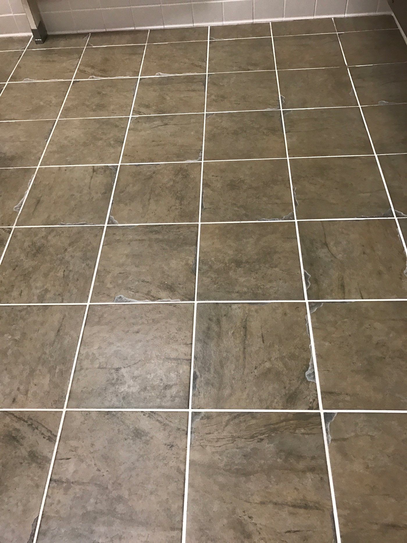 Brown Square Tiles Flooring — Minneapolis, MN – Elver’s Cleaning Service