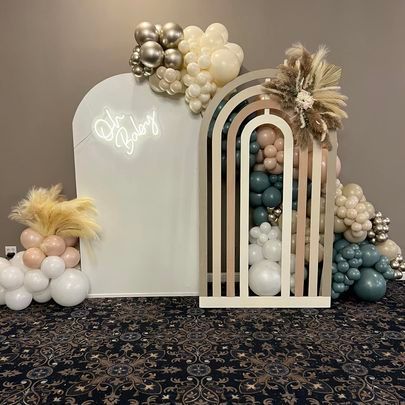 elegant circus first birthday balloon garland backdrop and blessed baptism event