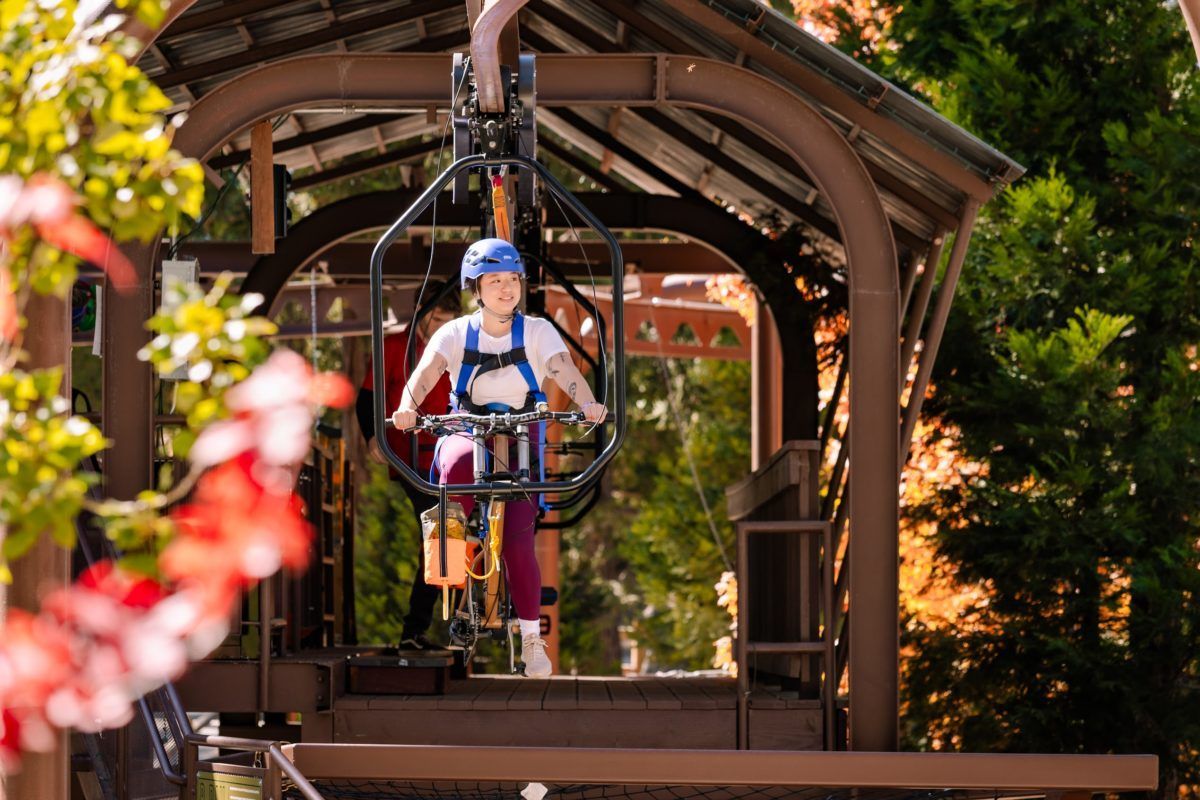 A sunset over a mountain range with a lot of fog