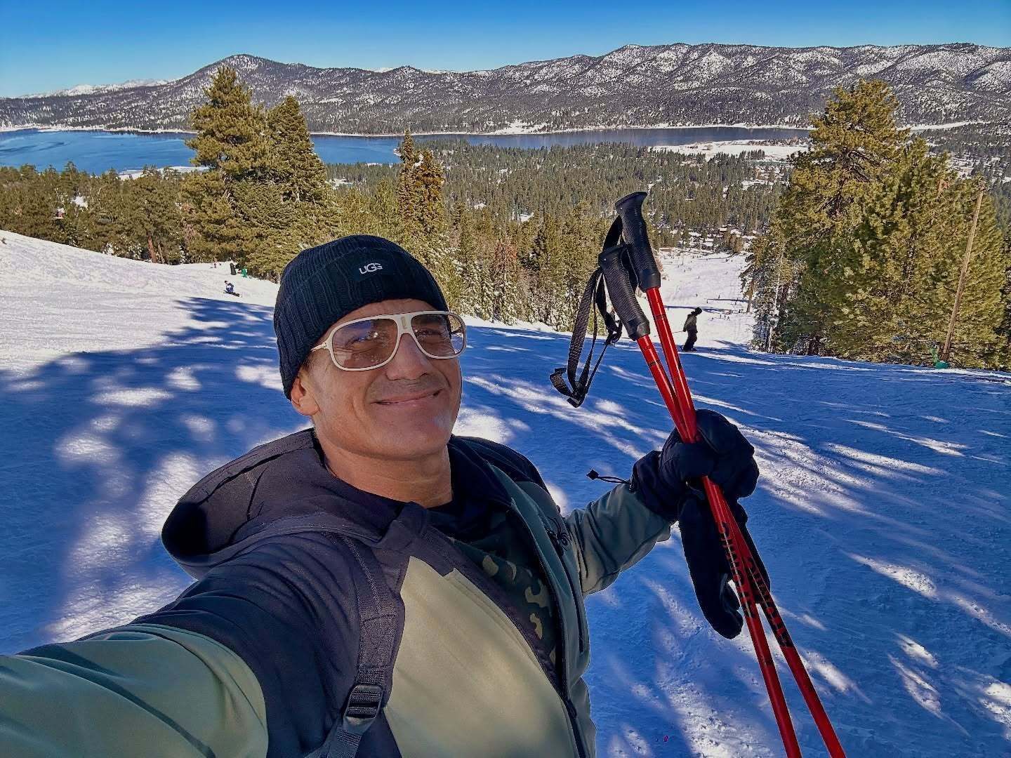 A sunset over a mountain range with a lot of fog