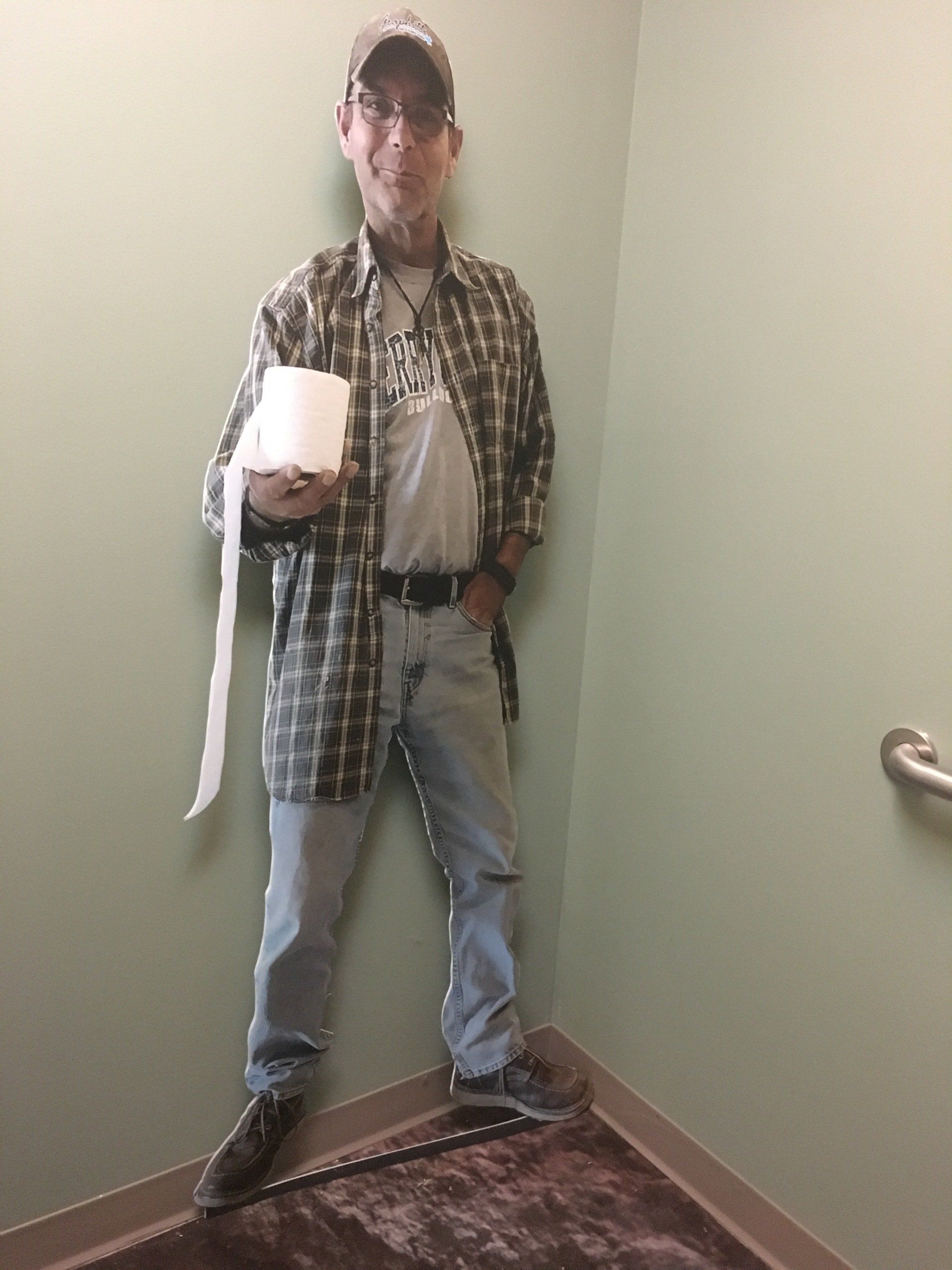Life Size —Man Holding Tissue in Franklin, TN