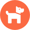 A white dog is standing in an orange circle.