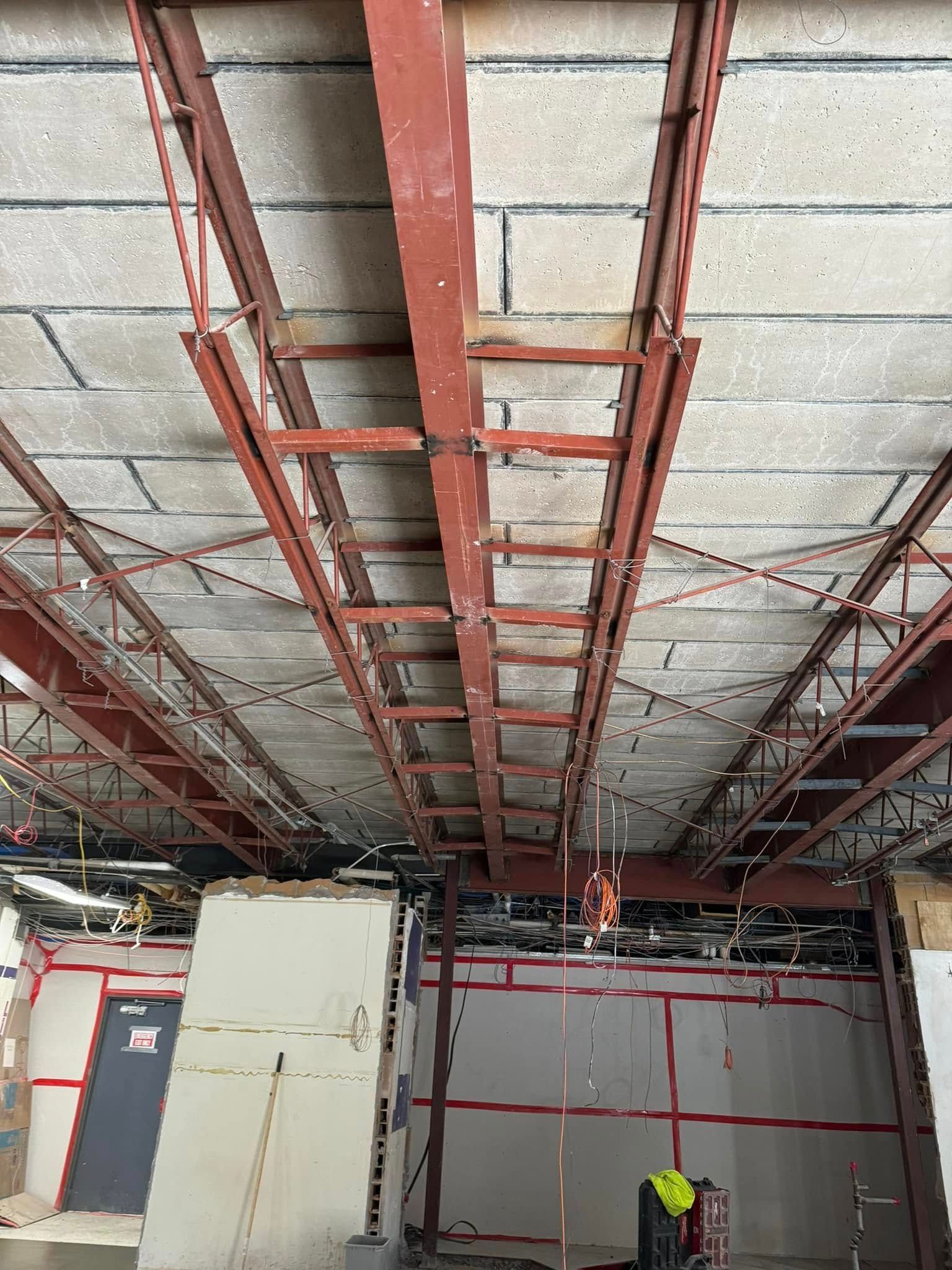 A wooden fence with a gate attached to it.