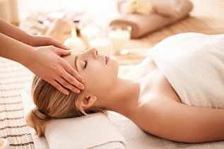 Woman Enjoying a Head Massage — Massage Therapy in Sarasota, FL