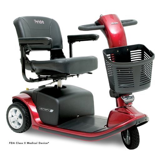 A red mobility scooter with a basket attached to it.