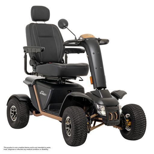 A black and gold mobility scooter with a large tire on a white background.