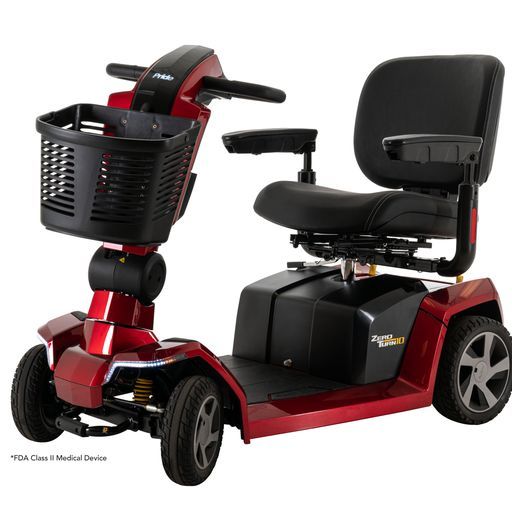 A red mobility scooter with a basket attached to it