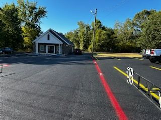 A red line is painted on the side of the road