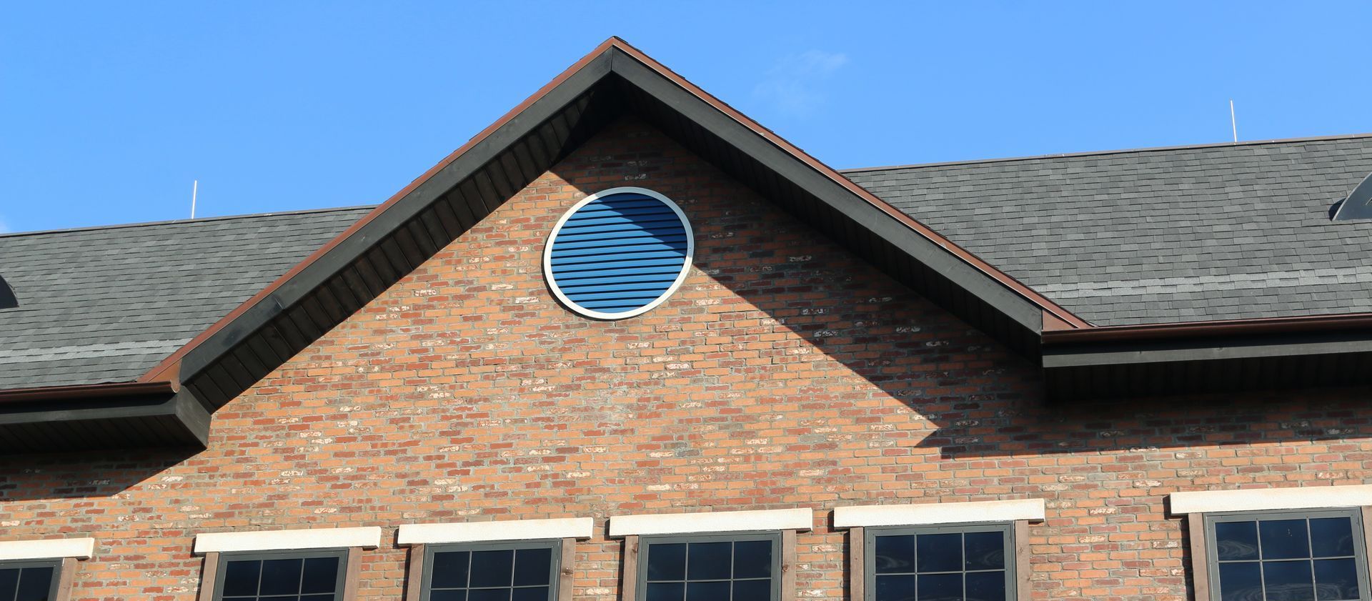 An Empty Parking Lot With Yellow Lines on It