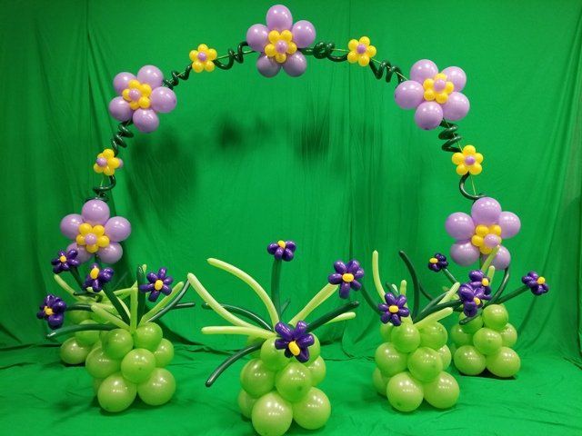 balloons created into a flower patters for an archway