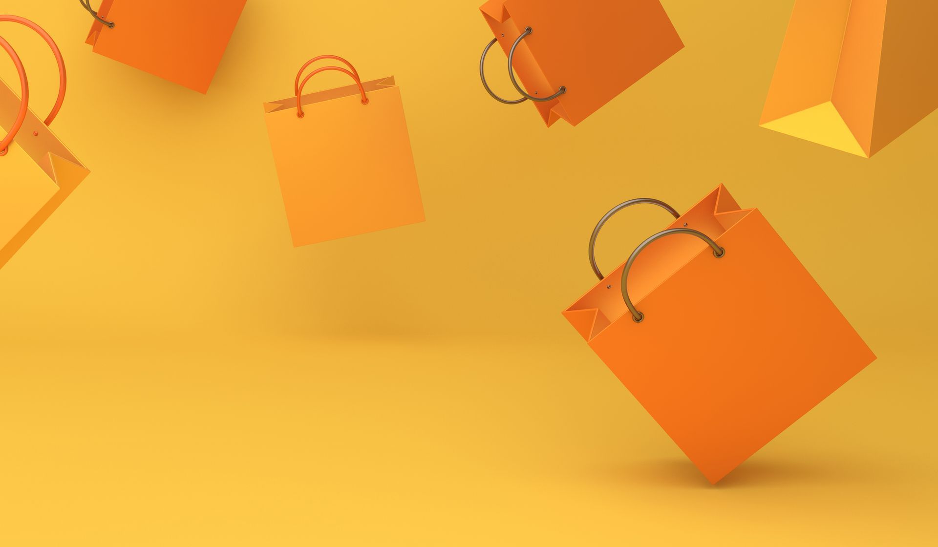 On a light yellow background, golden yellow and light orange shopping bags are randomly placed over two-thirds of the image.